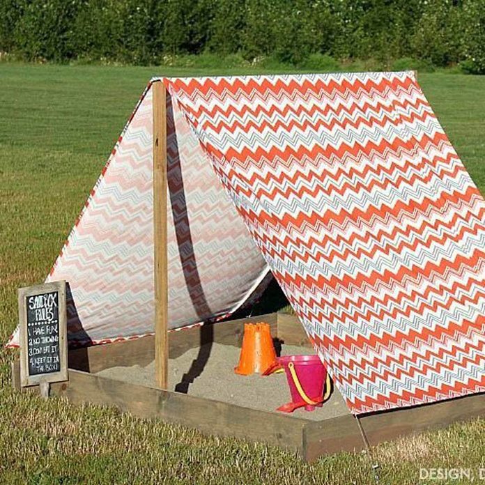 sandbox with tent