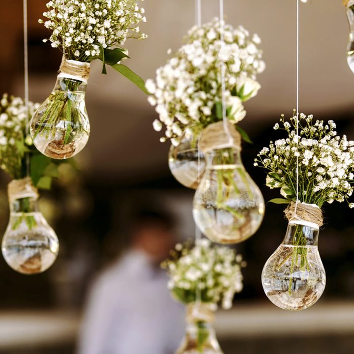 whimsical hanging lightbulb flowers wedding diy wedding decorations