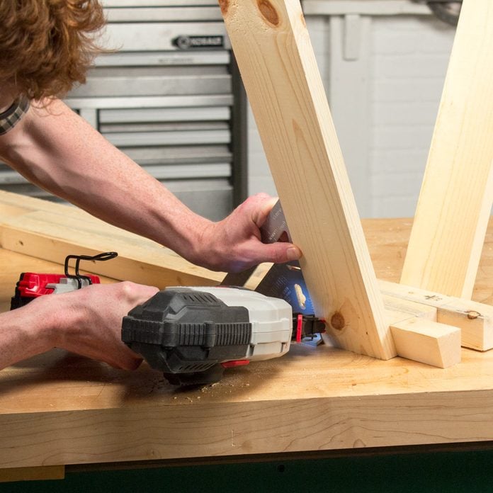 Adjustable Sawhorse Create and attach legs to the top assembly