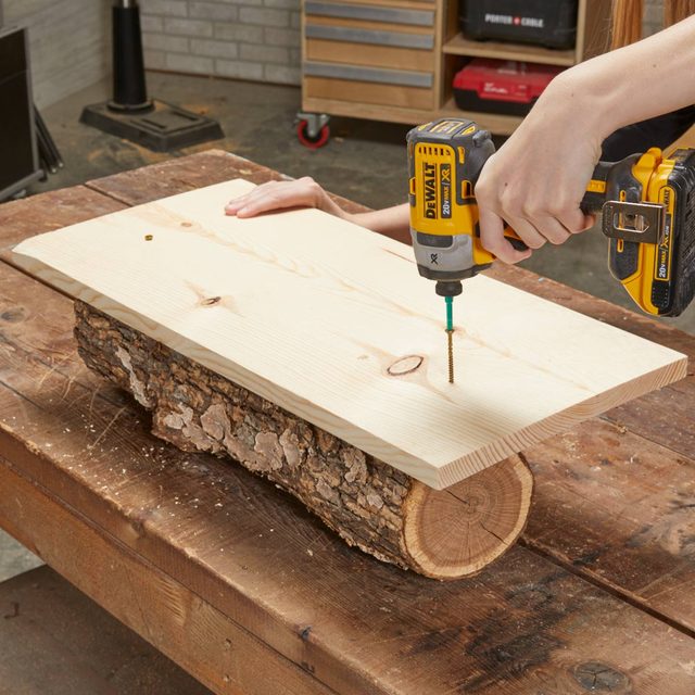 Wood log planter attach board to stabalize
