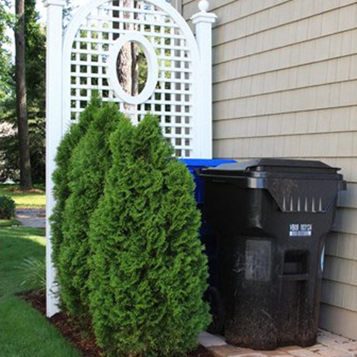 9 Ways To Disguise Your Trash Bin, Hiding Garbage Cans Outdoors