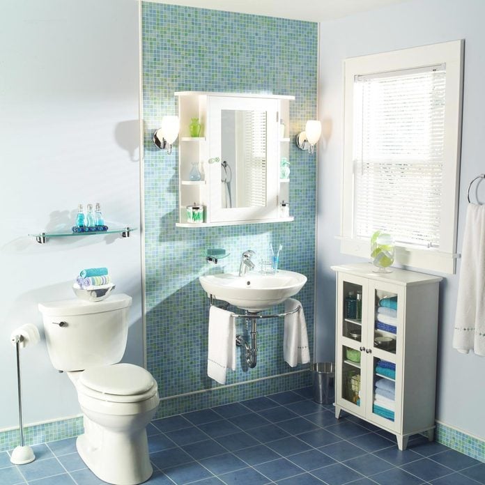 Bathroom makeover after blue teal tile wall