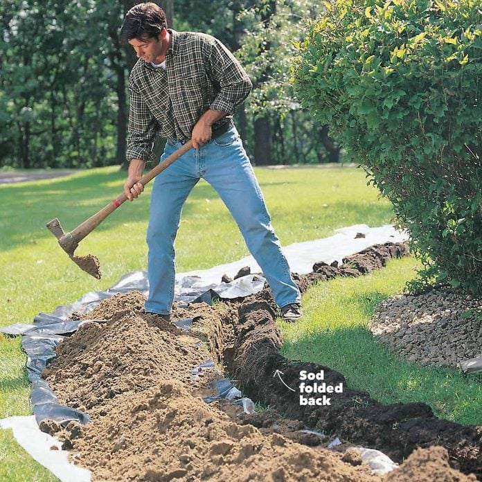 fold back the sod digging holes