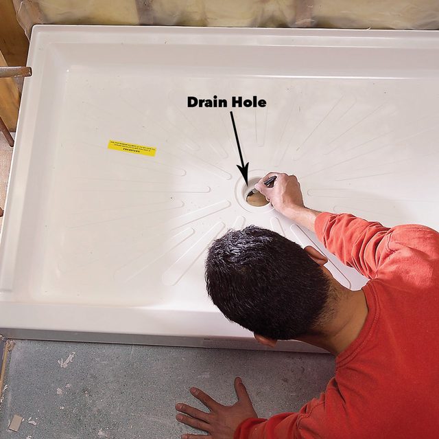 Mark the new drain hole shower install
