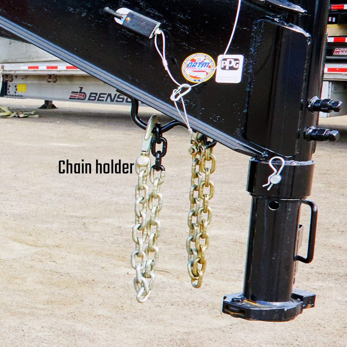 Chain holders under trailer arm | Construction Pro Tips
