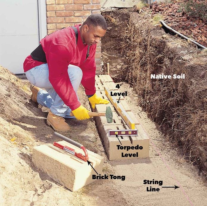 How to Build a Concrete Retaining Wall (DIY) | Family Handyman