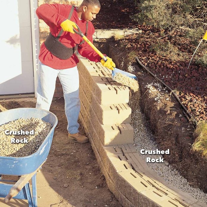 How To Build A Concrete Retaining Wall Diy Family Handyman - How To Cut Cement Retaining Wall Blocks