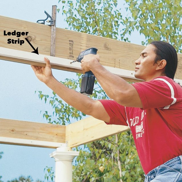attach ledger strips to beams pergola