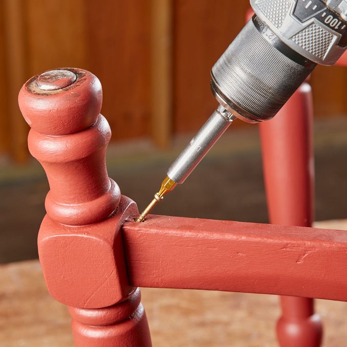 tighten a wobbly chair with trim screws
