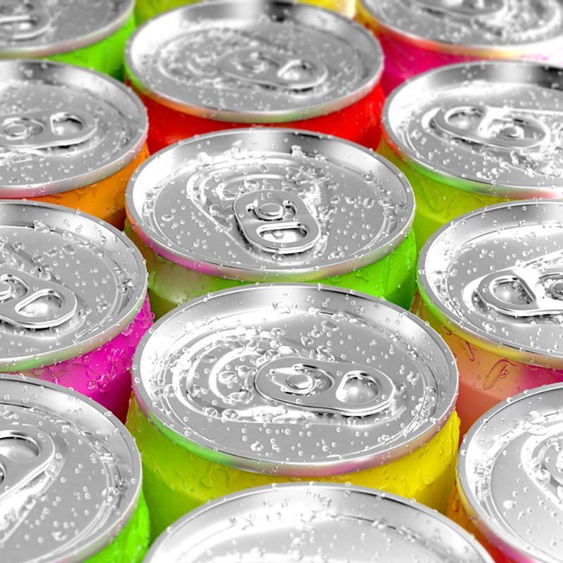 Colorful aluminum cans with water drops.