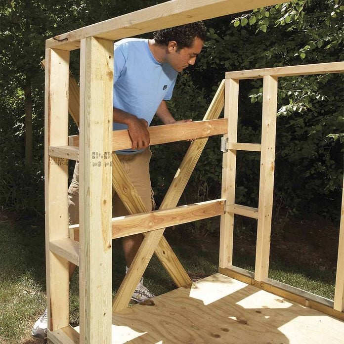 small outdoor storage sheds - installing purlins