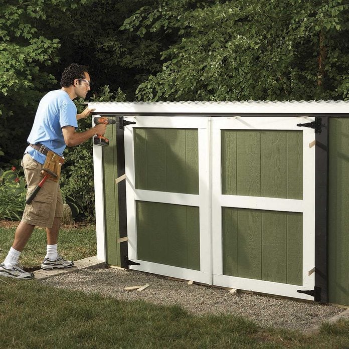 build lawn mower shed - doors and paint