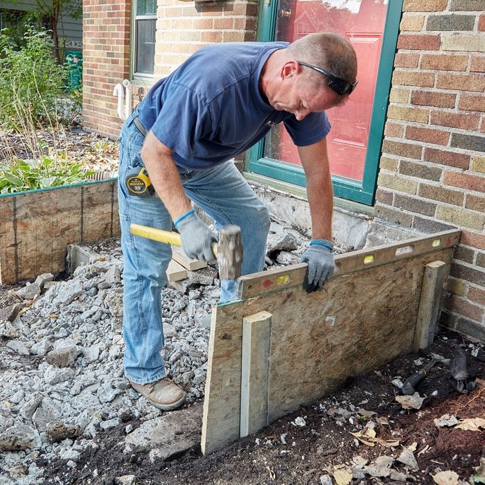 Making sure that the forms are plumb and level | Construction Pro Tips