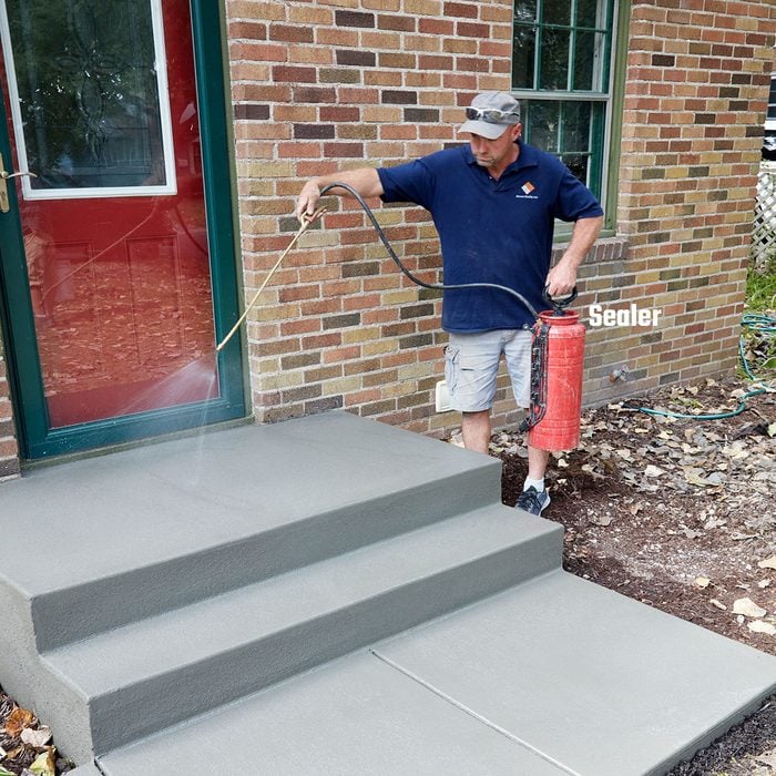 Man sealing a step with Concrete Sealer | Construction Pro Tips