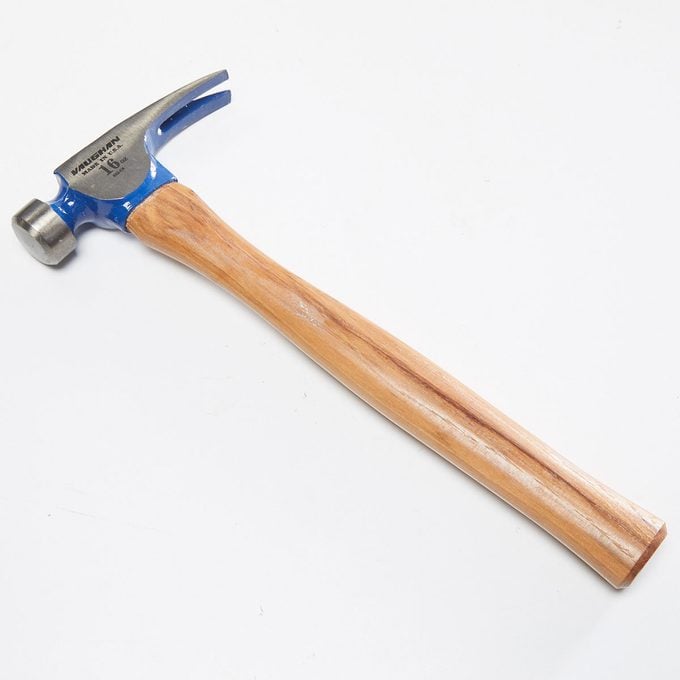 A hammer with a wooden handle | Construction Pro Tips