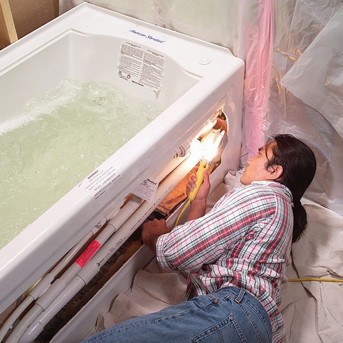 https://www.familyhandyman.com/wp-content/uploads/2018/11/FHM-How-to-Install-a-Whirlpool-Tub-FH03OCT_03102_032-700x700.jpg