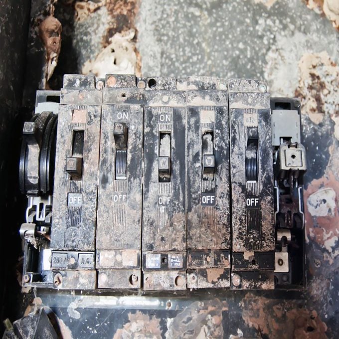 Corroded interior of an electrical panel | Construction Pro Tips