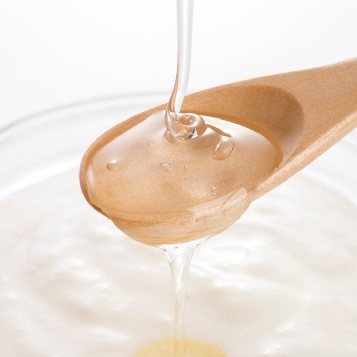Pour oligosaccharide on yoghurt; Shutterstock ID 1020098641; Job (TFH, TOH, RD, BNB, CWM, CM): Taste of Home