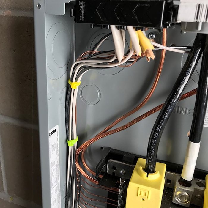 Cords zip-tied inside an electrical box | Construction Pro Tips