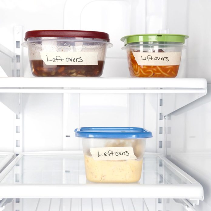 Leftover containers of food in a refrigerator for use with many food inferences.; Shutterstock ID 66906010