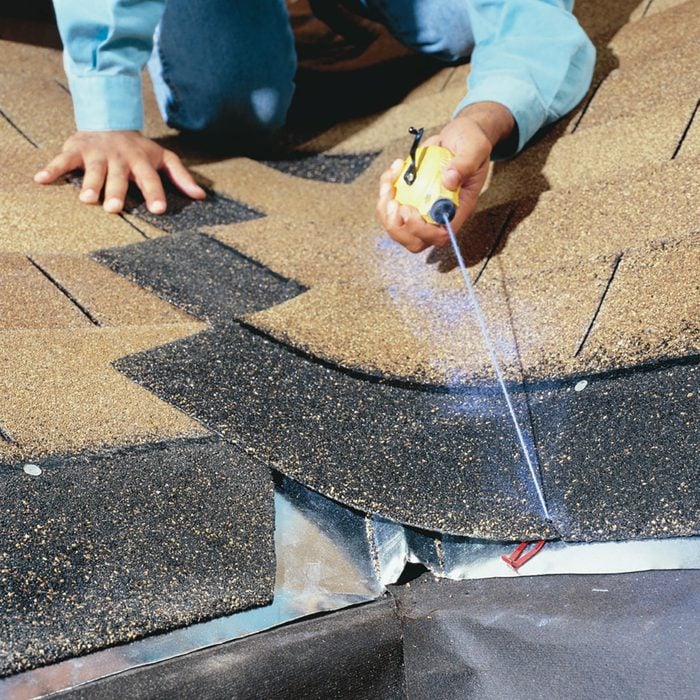 Snapping a chalk line on shingles | Construction Pro Tips