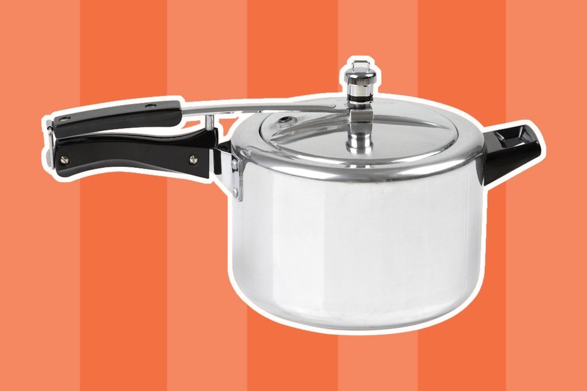 High pressure aluminum cooking pot with safety cover an image isolated ; Shutterstock ID 84376723