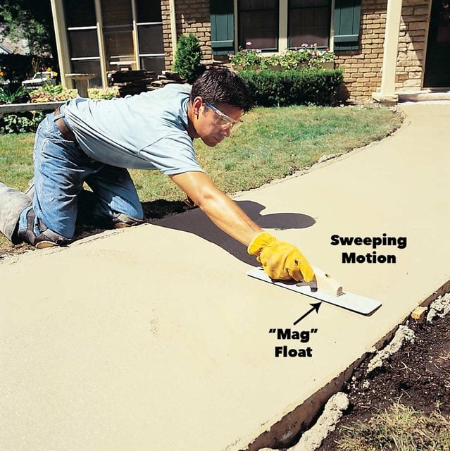 Smooth concrete sidewalk with a mag float