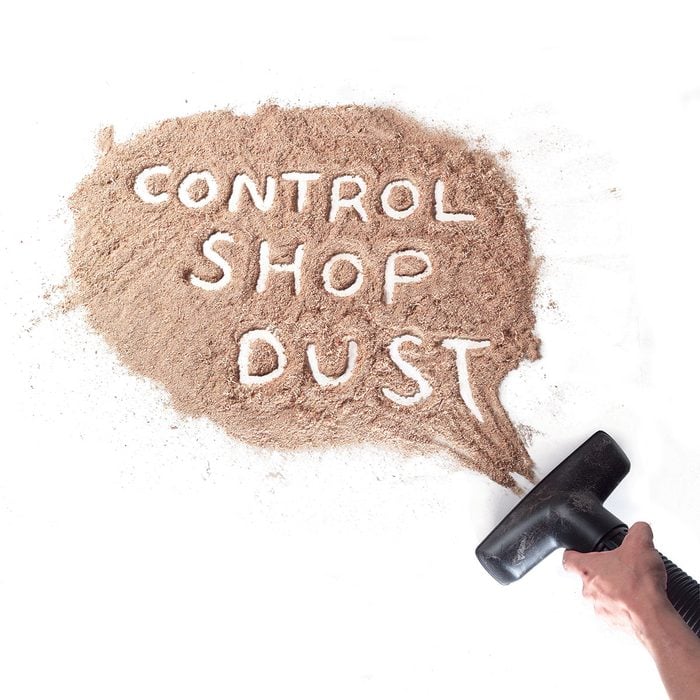 'Control Shop Dust' written in a pile of shop dust | Construction Pro Tips