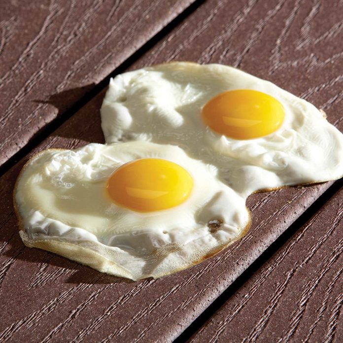 fried egg on dark composite deck