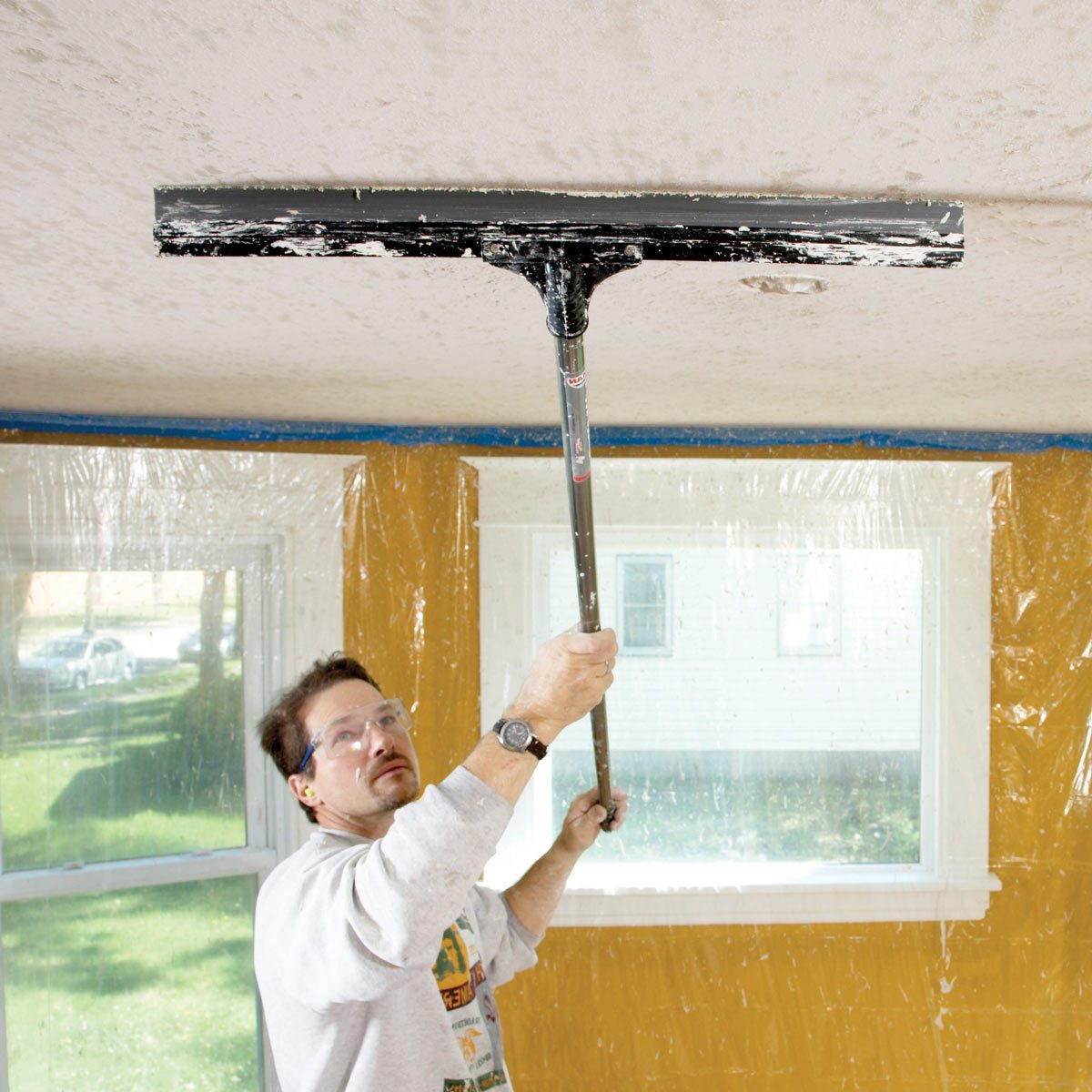 How to use a sponge to match knockdown texture on a ceiling repair 