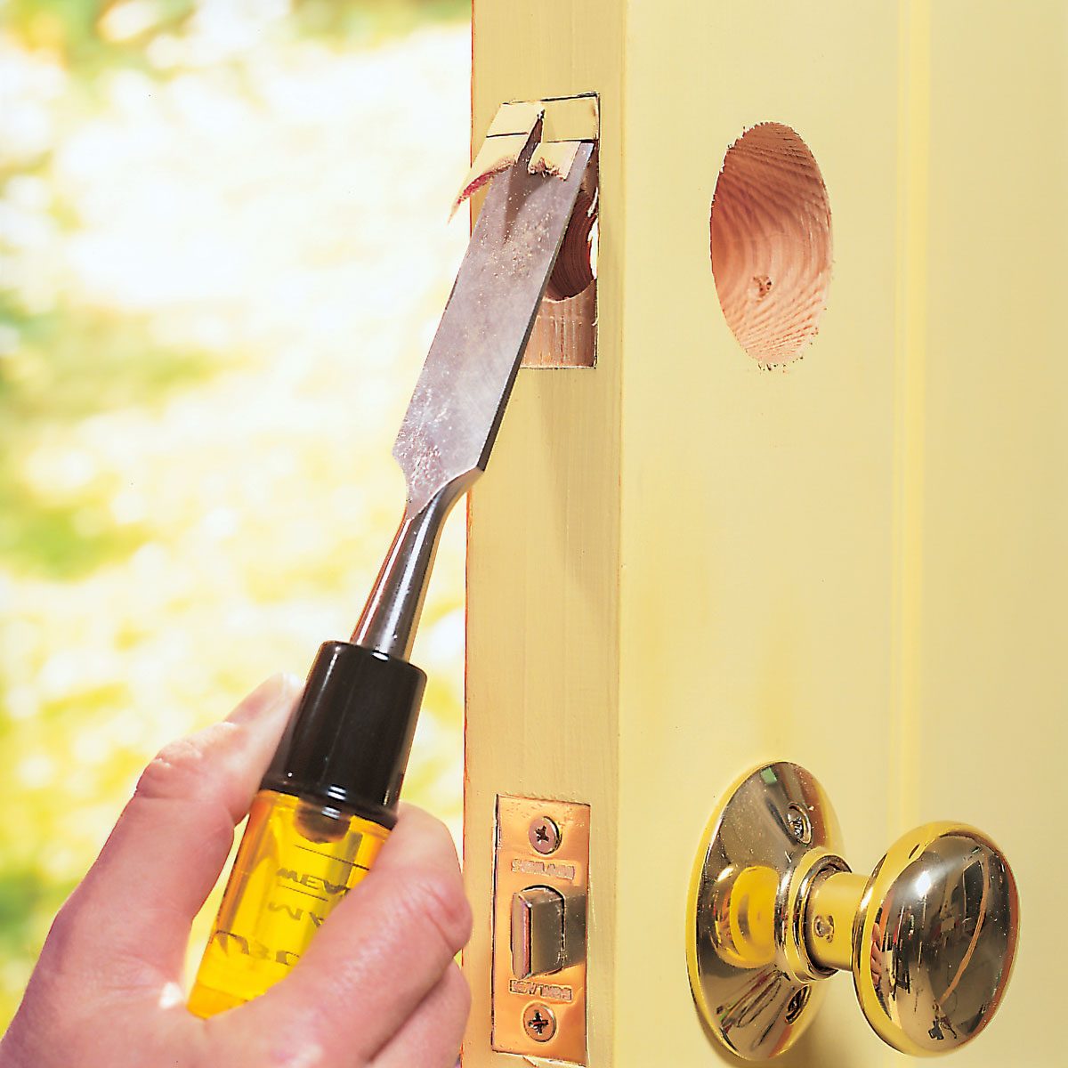 Chiseling out a wooden door for installing deadbolt lock, How To Install A Deadbolt Lock