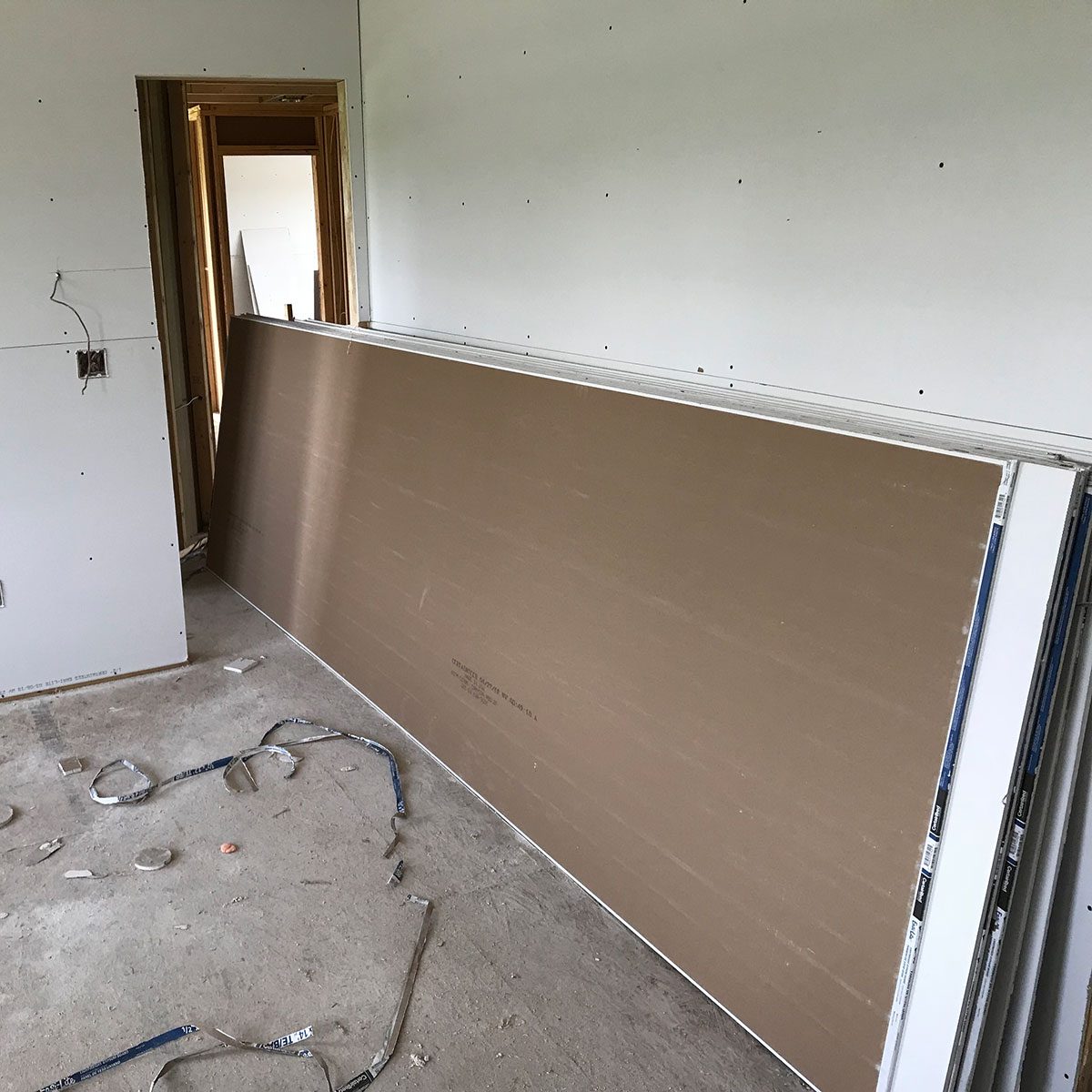 Long drywall sticking out of a door | Construction Pro Tips