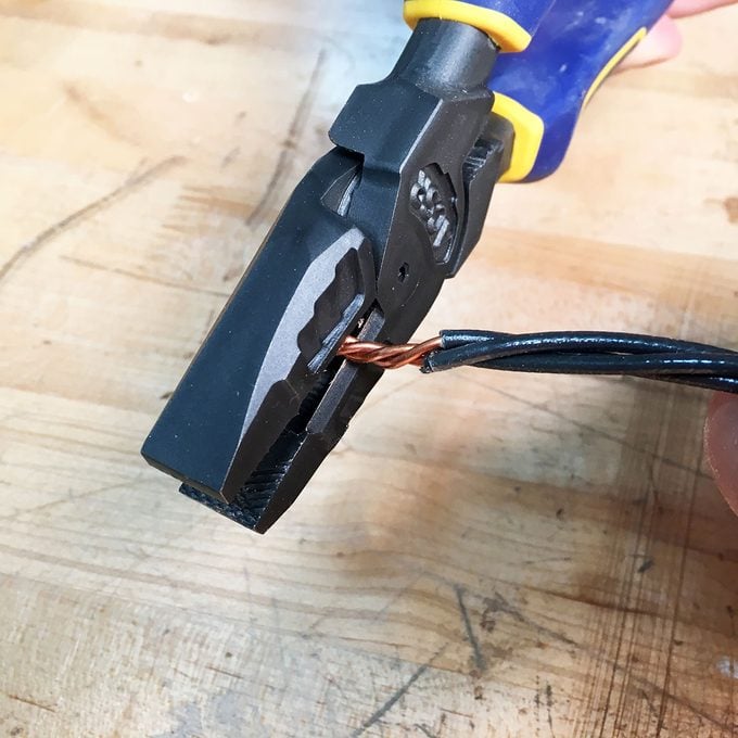 Clipping wires with linesmans pliers | Construction Pro Tips