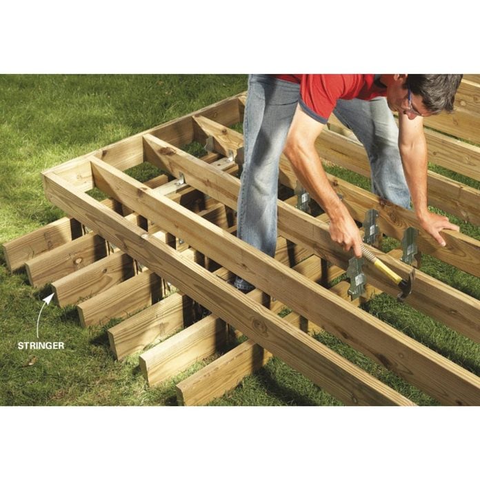 Backyard Decks Build An Island Deck, How To Build A Ground Level Deck Using Blocks