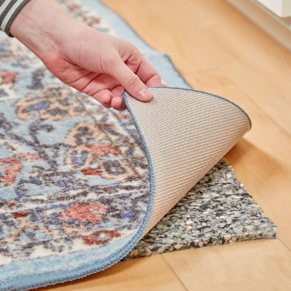 4 Easy Ways How To Keep A Rug In Place On A Carpet - Rug Pads