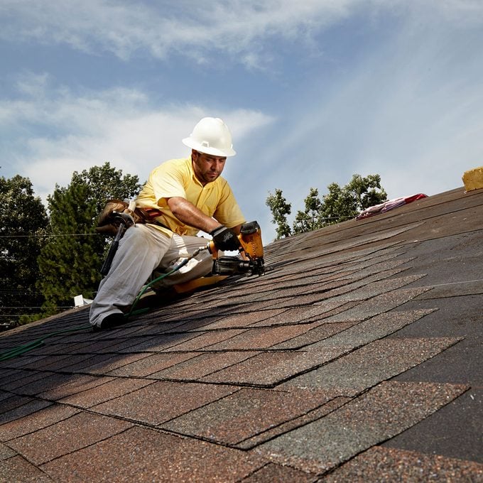 A man roofing a house | Construction Pro Tips