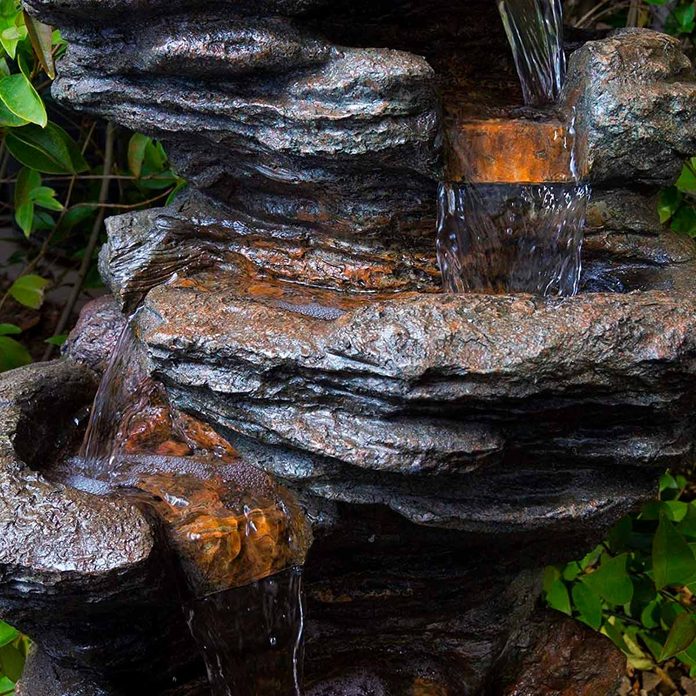 10 Dreamy Backyard Water Features You Can Family Handyman - Garden Oasis Rock Waterfall Fountain