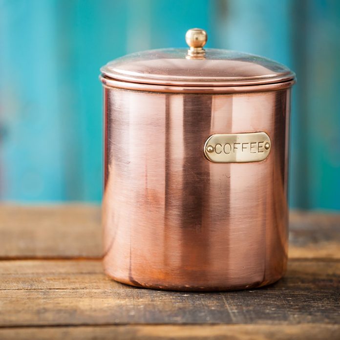 Antique Vintage Copper Coffee Container On Rustic Wood Background With Copy Space