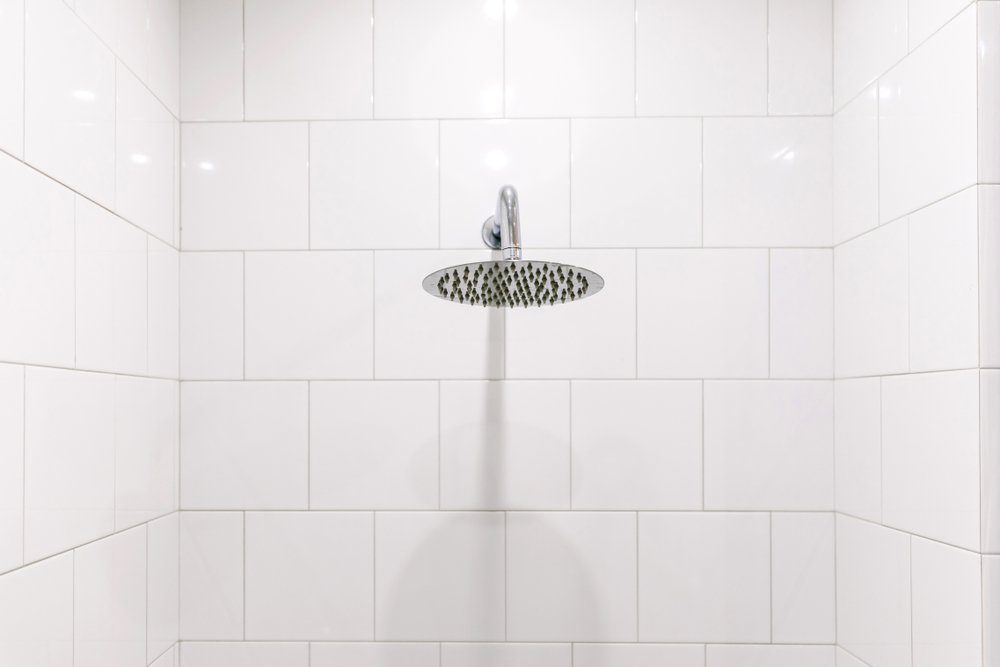 https://www.familyhandyman.com/wp-content/uploads/2019/03/shower-head-bathroom.jpg