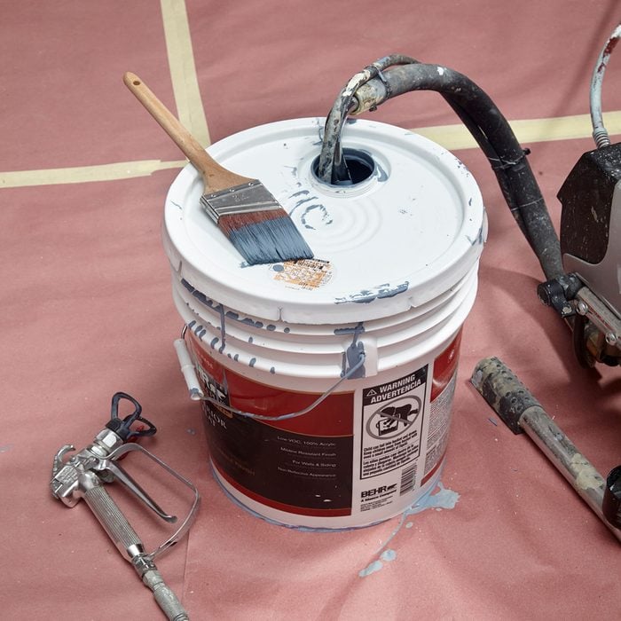 getting paint from a bucket into a spray painter | Construction Pro Tips