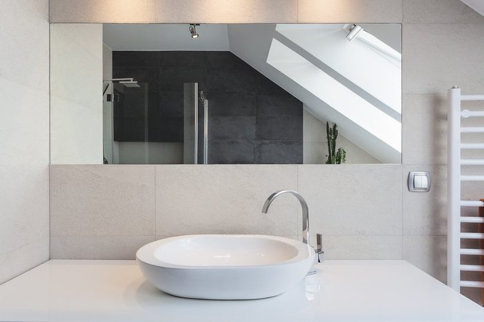 Urban apartment - white bath counter and vessel sink