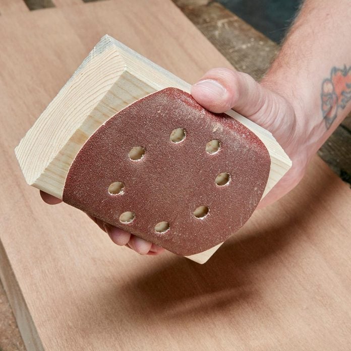 Sandpaper-disc-wrapped-around-wood-block