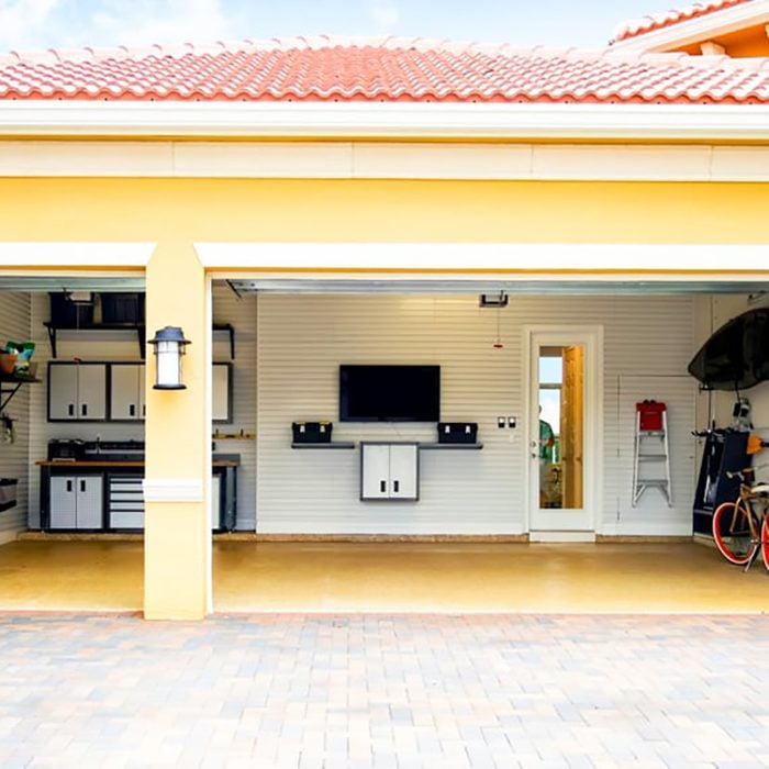 Tv In Garage Paver Driveway Is 1
