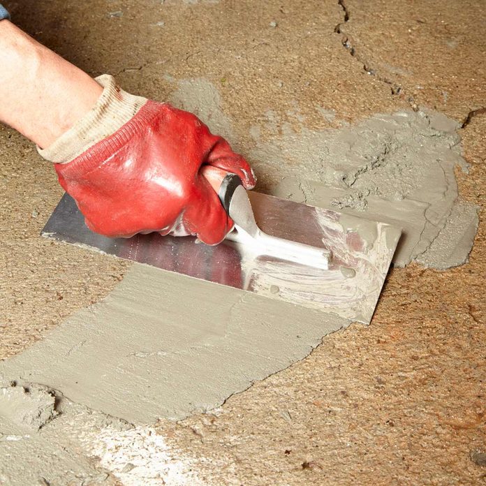 Garage Floor Resurfacing Fix A Pitted, How To Fix Rough Concrete Garage Floor