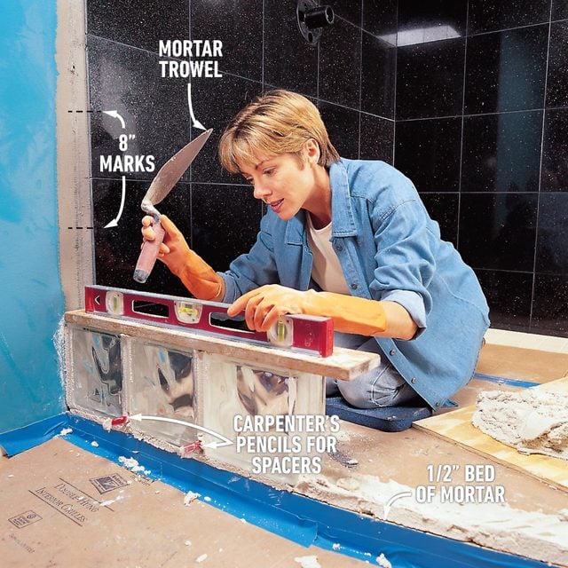 Levelling the blocks to install a glass block shower