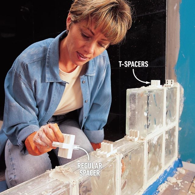 using plastic spacers for straight walls to install a glass block shower