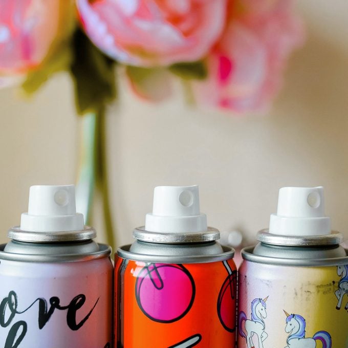 colorful aerosol cans
