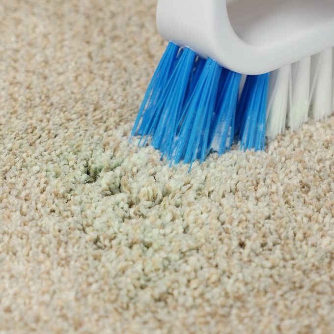 Scrubbing slime stain out of carpet