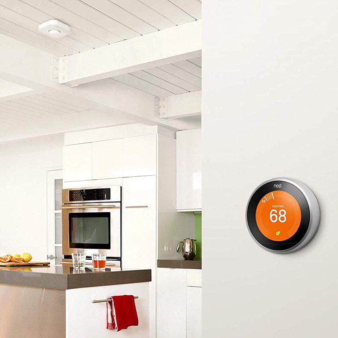 Nest smart thermostat in kitchen