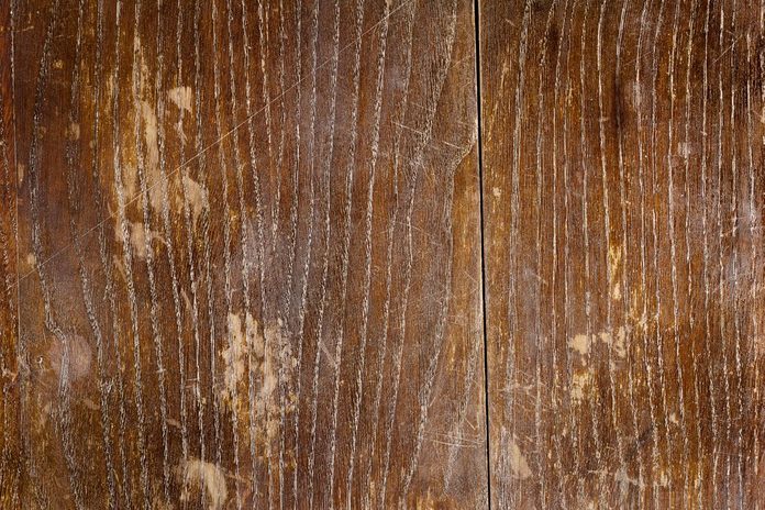Old scratched oak table top texture background